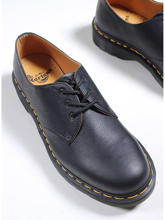 DR. MARTENS Stringata Moda